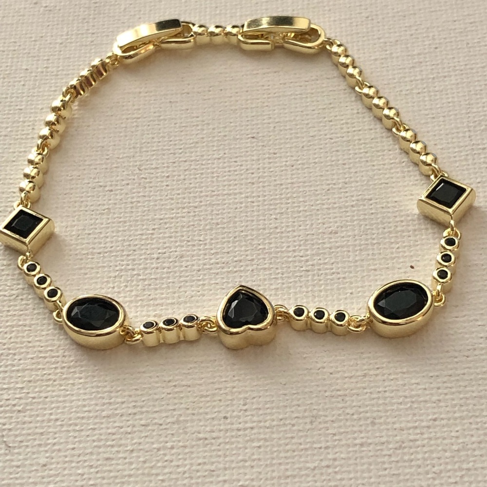 Gold Bracelet with Black Gem Accents